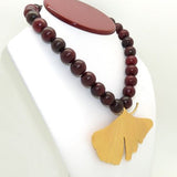 Ginkgo Bold Gold Leaf Red Horn Bead Adjustable Necklace by Michael Michaud - ILoveThatGift