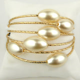 Set of Gold Toned Bangles Bracelets with Pearls by Liza Kim